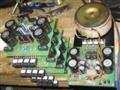 Disassembly of the amplifier channels in order to drill and tap the tops of the heatsinks and pot the transformers