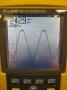 Mains voltage and waveform when the amplifier is delivering 1kHz full power into 8R.