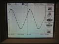 40Hz sine wave, into clipping, 4R. This is the point where the clip limiter activates. Slanting of top and bottom of waveform suggests 50Hz power supply ripple, but this is considerably less than most designs.