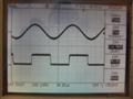 10kHz 8R square wave, shows phase shift. Bottom trace is amplifier input from the signal generator, top trace is amplifier output. The amplifier filters out all the harmonics necessary to make a square wave and turns the wave into an almost perfect sine wave.