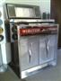 Completed and re-assembled jukebox installed in customer's home. She loves playing her old 45s on a great sounding machine!